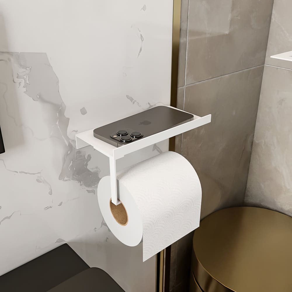 Modern minimalist bir banyoda, rafında akıllı telefon bulunan beyaz duvara monte tuvalet kağıdı tutucusu.
