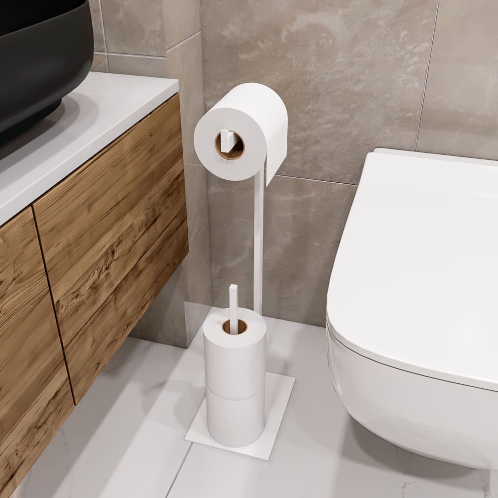 Nötr tonlarda bir banyoda, ahşap bir lavabo dolabının ve modern bir tuvaletin yanına yerleştirilmiş, minimalist tasarıma sahip şık beyaz bir tuvalet kağıdı tutucu standı.