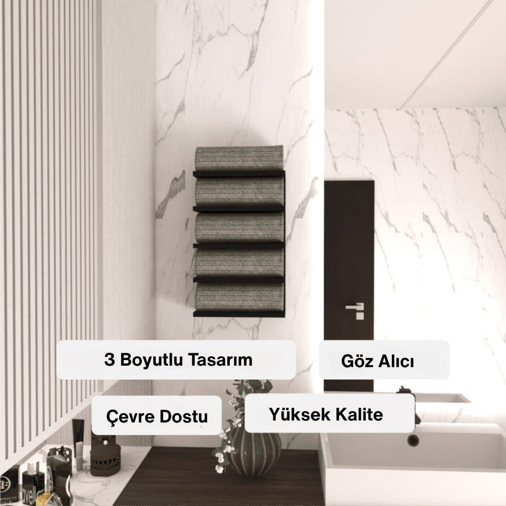 Mermer duvarlı modern bir banyoda duvara monte edilmiş 3 boyutlu tasarıma sahip siyah metal havlu rafı. Üzerinde düzenli şekilde yerleştirilmiş havlular ve altında “3 Boyutlu Tasarım”, “Göz Alıcı”, “Çevre Dostu” ve “Yüksek Kalite” gibi özellik vurguları bulunur.