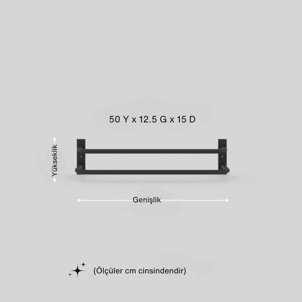 Duvara monte edilmiş siyah metal havluluk ölçüleri gösterilmektedir: 50 Y x 12.5 G x 15 D. Görselde yükseklik ve genişlik yönleri oklarla işaretlenmiş ve alt kısımda “Ölçüler cm cinsindendir” ifadesi yer almaktadır