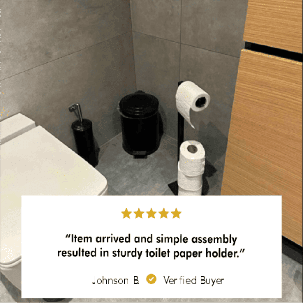 Minimalist toilet paper holder in a modern bathroom with grey tiled walls and a sleek, sturdy design. The image showcases a five-star review by a verified buyer, Johnson B., praising the easy assembly and robust construction of the product.