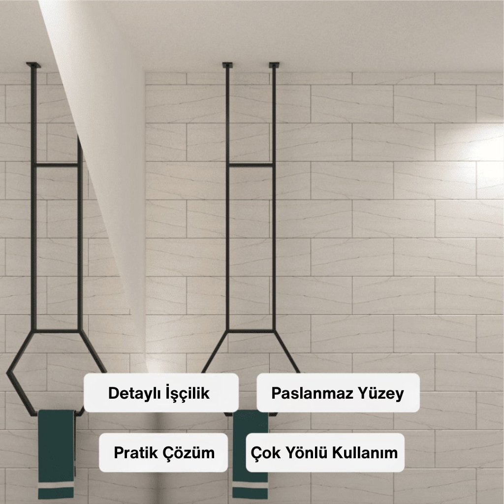 “Paslanmaz yüzeyli, detaylı işçilikle üretilmiş çok yönlü kullanıma uygun uzun metal havlu askılığı banyo duvarında.”