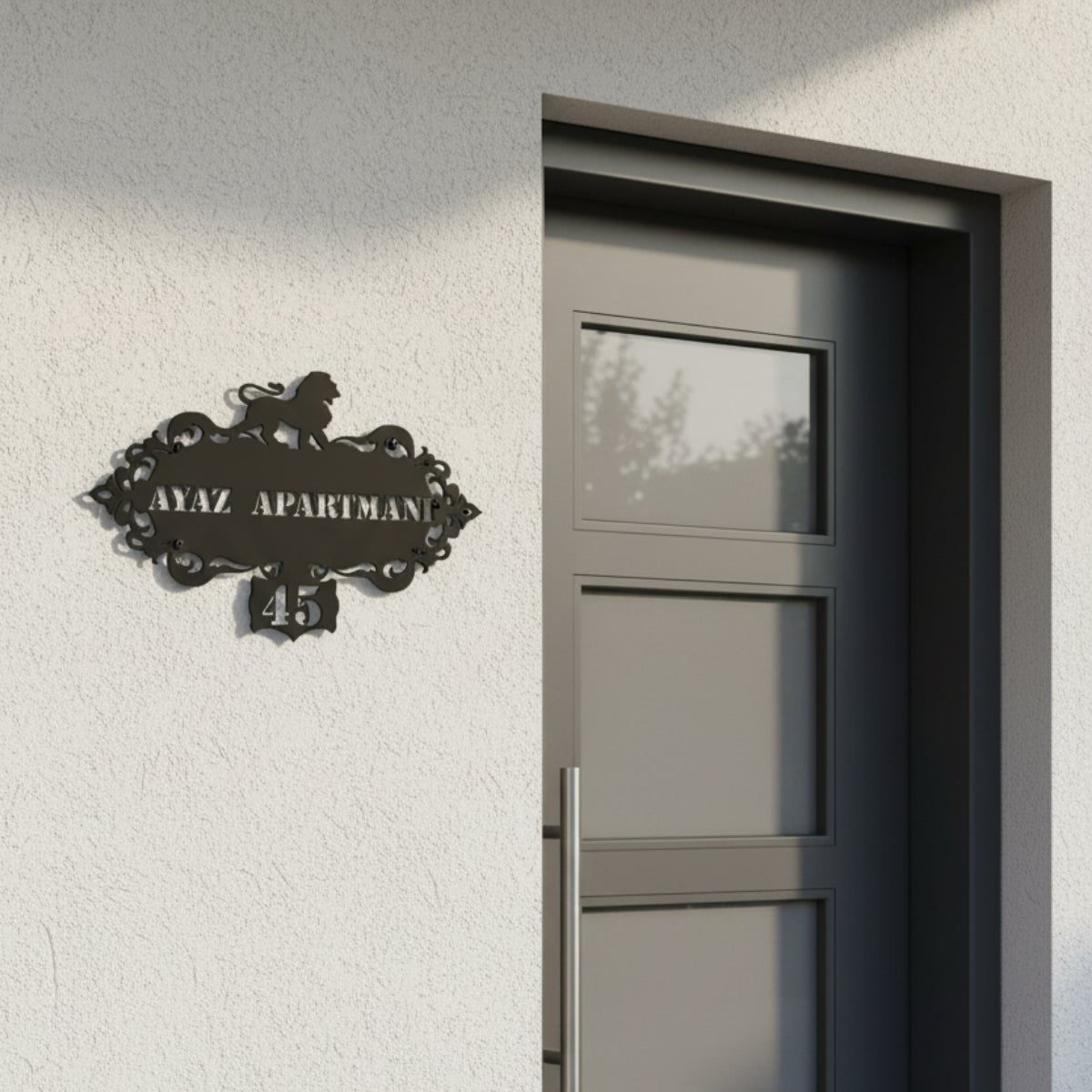 Apartman ve site girişleri için tasarlanmış, klasik süslemeli çerçeve detaylarına sahip duvar tipi bina isimlik tabelası.