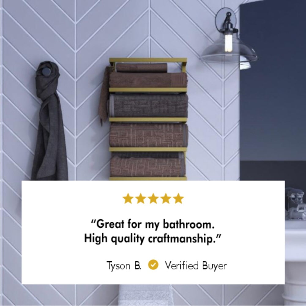 Wall-mounted gold and black towel rack holding folded brown towels in a modern bathroom, featuring a five-star customer review stating, 'Great for my bathroom. High quality craftsmanship.' by Tyson B., a verified buyer.